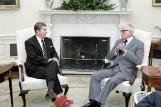 U.S. President Ronald Reagan meeting with Arizona Senator Barry Goldwater in the Oval Office of the