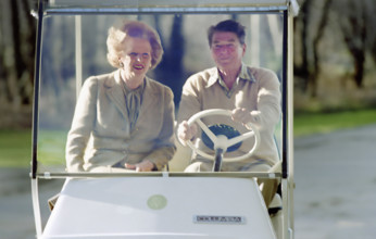 U.S. President Ronald Reagan driving golf cart with British Prime Minister Margaret Thatcher, Camp
