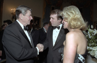 U.S. President Ronald Reagan shaking hands with Donald Trump and Ivana Trump during state visit of