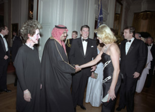 U.S. President Ronald Reagan, U.S. First Lady Nancy Reagan and Donald Trump looking on as Ivana
