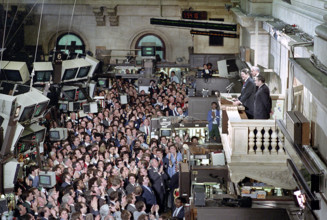 U.S. President addressing New York Stock Exchange employees during visit to the trading floor, New