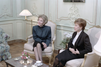 U.S. First Lady Nancy Reagan having first tea with Raisa Gorbachev at Maison De Saussure, Geneva,