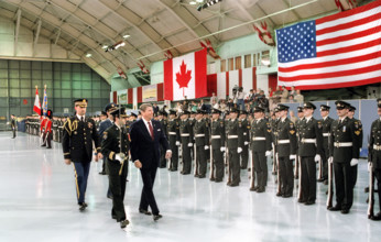 U.S. President Ronald Reagan inspecting troops during arrival ceremony at Upland Canadian Forces