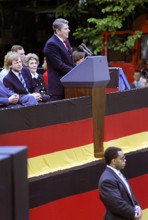 U.S. President Ronald Reagan giving remarks at Brandenburg Gate with U.S. First Lady Nancy Reagan