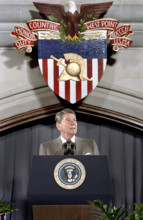 U.S. President Ronald Reagan standing at podium during remarks to cadets, United States Military