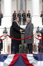 U.S. President Ronald Reagan and Soviet General Secretary Mikhail Gorbachev shaking hands at