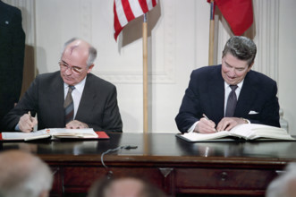U.S. President Ronald Reagan and Soviet General Secretary Mikhail Gorbachev signing INF Treaty,