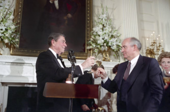U.S. President Ronald Reagan and Soviet Secretary General Mikhail Gorbachev toast during State