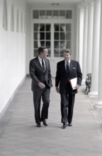 U.S. President Ronald Reagan and U.S. Vice President George H.W. Bush walking along White House