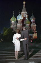 Rear view of U.S. President and U.S. First Lady Nancy Reagan visiting Red Square at night during