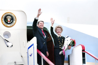 U.S. President Ronald Reagan and U.S. First Lady Nancy Reagan waving goodbye via Air Force One at