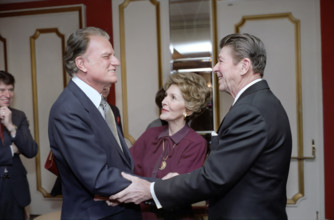 U.S. President Ronald Reagan, U.S. First Lady Nancy Reagan and American Evangelist Billy Graham at