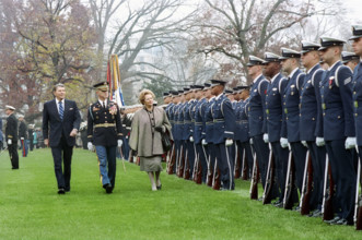 U.S. President Ronald Reagan and British Prime Minister Margaret Thatcher reviewing U.S. military