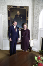 U.S. President Ronald Reagan and British Prime Minister Margaret Thatcher standing in front of