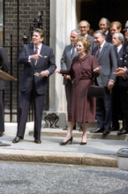 U.S. President Ronald Reagan and British Prime Minister Margaret Thatcher standing in front of 10