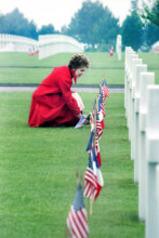U.S. First Lady Nancy Reagan laying flowers at Omaha Beach Memorial Cemetery, Colleville-sur-Mer,