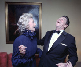 U.S. President Ronald Reagan laughing with American actress Gloria Stewart (and wife of American