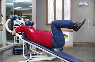 U.S. President Ronald Reagan exercising in gym at Camp David, Frederick County, Maryland, USA,