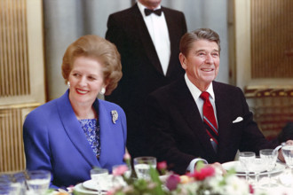 U.S. President Ronald Reagan sitting next to British Prime Minister Margaret Thatcher during dinner