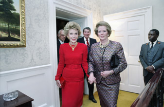 U.S. First Lady Nancy Reagan holding hands with British Prime Minister Margaret Thatcher with U.S.