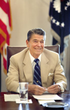 U.S. President Ronald Reagan smiling during meeting with Republican Congressional Leadership in the