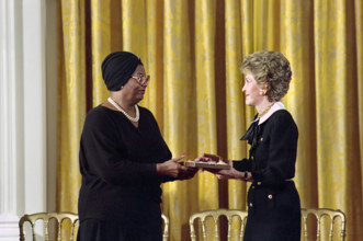 U.S. First Lady Nancy Reagan presenting Presidential Medal of Freedom to American entertainer Pearl