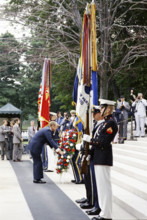 U.S. President Gerald R. Ford placing wreath at base of Tomb of the Unknown Soldier on Memorial