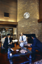 U.S. President Gerald R. Ford meeting with President Suharto of Indonesia in the living room of