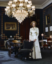 U.S. First Lady Betty Ford, full-length portrait in long white satin gown, White House Treaty Room,