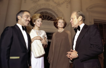 U.S. President Gerald R. Ford and U.S. First Lady Betty Ford saying goodnight to King Hussein and