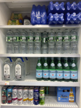 Shelves of bottled water and various beverages, Duane Reade retail store, Tribeca, Manhattan, New