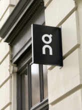 On running shoes and apparel retail store, company logo on building exterior, 162 Fifth Avenue,