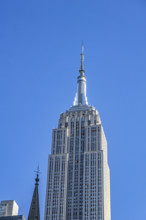 Empire State Building against blue sky, Manhattan, New York City, New York, USA