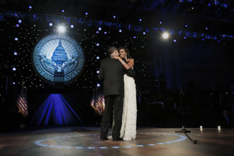 U.S. President Barack Obama and U.S. First Lady Michelle Obama dancing at Neighborhood Inaugural
