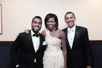 U.S. President Barack Obama and U.S. First Lady Michelle Obama greet American performer Kanye West