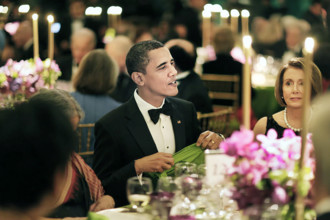 U.S. President Barack Obama (with Nancy Pelosi at right), hosting state dinner in honor of Prime