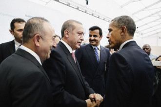 U.S. President Barack Obama talking with President Recep Tayyip Erdogan of Turkey after opening