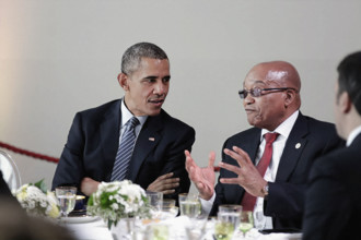 U.S. President Barack Obama talking with President Jacob Zuma of South Africa during lunch hosted