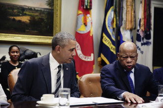 U.S. President Barack Obama with U.S. Congressman John Lewis during meeting with civil rights