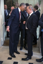 U.S. President Barack Obama talking with President Vladimir Putin of the Russian Federation, after