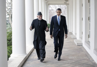 U.S. President Barack Obama and President Hamid Karzai of Afghanistan walking along White House