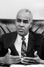 Roy Wilkins, Executive Director of the NAACP, head-and-shoulders portrait, seated, facing front,