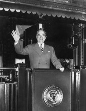 U.S. President Harry S. Truman waving from rear platform of train as he begins his 1948
