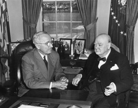 U.S. President Harry S. Truman and Winston Churchill, Prime Minister of Great Britain, sit down in