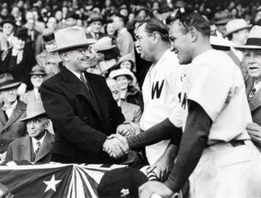 U.S. President Harry S. Truman (left) shaking hands with Washington Senators starting pitcher Bobo