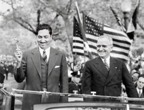 President Miguel Aleman of Mexico (left) holding ceremonial key to city while  U.S. President Harry