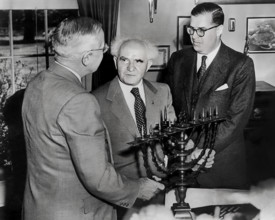 U.S. President Harry S. Truman receiving a gift of a menorah from Israel Prime Minister David