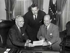 U.S. President Harry S. Truman (left) meeting with Governor Adlai Stevenson of Illinois (right) and