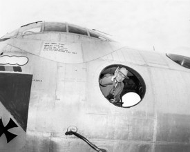 U.S. President Harry S. Truman waving from inside B-36A bomber at an air show, Andrews Air Force