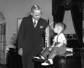 U.S. President Harry S. Truman chatting with Michael Dene Condatore in the White House Oval Office
